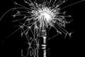 Fireworks sparkler showing through LED light bulb - black & whit Royalty Free Stock Photo