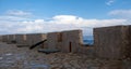 Firkas Fortress worn wall, antique cannon on paved yard at Old Town of Chania Crete, Greece