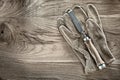 Firmer chisel working gloves on wooden board