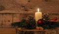 First Advent candle burning, traditional Christmas decoration Royalty Free Stock Photo