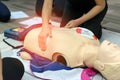 First aid cardiopulmonary resuscitation course using AED training.