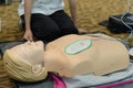 First aid cardiopulmonary resuscitation course using automated external defibrillator device - AED training. selective focus Royalty Free Stock Photo