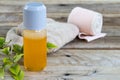 First aid with herbal oil medication liniment and bandage health care pains and aches for athlete