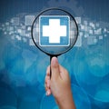 First Aid icon in Magnifying glass