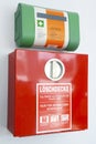 First aid kit and fire protection blanket with the German inscription `LÃÂ¶schdecke` fire blanket