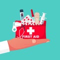 First aid kit in hand doctor