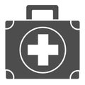 First aid kit solid icon. Medical bag, ambulance case symbol, glyph style pictogram on white background. Medicine or Royalty Free Stock Photo