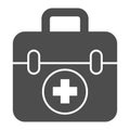 First aid kit solid icon, Medical concept, Medical Kit sign on white background, First aid box with cross icon in glyph Royalty Free Stock Photo