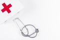 first aid kit with stethoscope white background. High quality photo Royalty Free Stock Photo