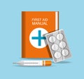 First aid manual with pills and thermometer Royalty Free Stock Photo