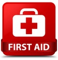 First aid red square button red ribbon in middle Royalty Free Stock Photo