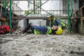 First aid support accident at work of builder worker in construction site. Accident falls from the scaffolding on floor, Foreman Royalty Free Stock Photo