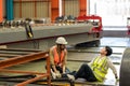 First aid support accident at work of worker at factory. Male worker has an accident  on the floor in factory site Royalty Free Stock Photo