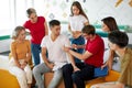 At first aid training classroom, group of students are learning to splint the hand of a patient Royalty Free Stock Photo