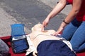 First aid training in using automated external defibrillator device - AED Royalty Free Stock Photo