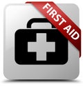 First aid white square button red ribbon in corner Royalty Free Stock Photo