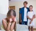 First amorousness: girl and couple of kids apart Royalty Free Stock Photo