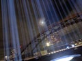 First Breath installation, Manchester beams of light going upward into sky with moon and bridge