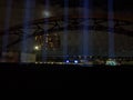 First Breath installation, Manchester beams of light going upward into sky with moon