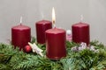 The first candle on the Advent wreath burns Royalty Free Stock Photo