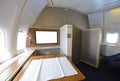 First class cabin with big table and blank screen