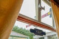 First Class compartment window seen on a steam train passenger coach. Royalty Free Stock Photo