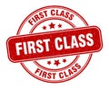 first class stamp. first class round grunge sign. Royalty Free Stock Photo