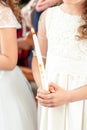 First communion girl. Hands of a little girl in the First Communion Day in the church Royalty Free Stock Photo