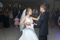 The first dance of gentle stylish happy blonde bride and groom Royalty Free Stock Photo