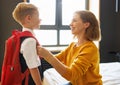 Mother preparing son for school studies Royalty Free Stock Photo