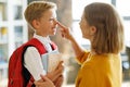 Mother preparing son for school studies Royalty Free Stock Photo