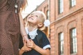 First day at school. Mother leads a little child school girl in first grade. Royalty Free Stock Photo