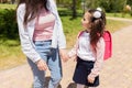 First day at school. mother leads a little child school girl in first grade Royalty Free Stock Photo