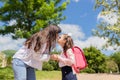 First day at school. mother leads a little child school girl in first grade Royalty Free Stock Photo