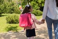 First day at school. mother leads a little child school girl in first grade Royalty Free Stock Photo