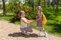 First day at school. mother leads a little child school girl in first grade Royalty Free Stock Photo