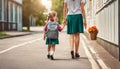 first day at school. mother leads little child school girl first grade. Royalty Free Stock Photo