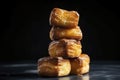 A tower of Kouign-Amann pastries filled with layers of caramelized sugar and butter.Â 