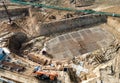 First floor slab rebar installation. Pile driver at construction site. Pile driven into ground by vibrating hydraulic hammer. Royalty Free Stock Photo