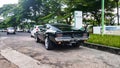 Surakarta Indonesia December 23 2021 black 1967 Ford Mustang fastback on a parking lot Royalty Free Stock Photo