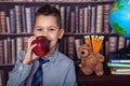 First-grader boy eating apple Royalty Free Stock Photo