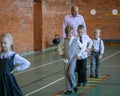 First graders in their first physical education class at the gym. Moscow, Russia, September 2, 2019