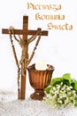 First holy communion composition with christianity symbols with text in polish First holy communion Royalty Free Stock Photo