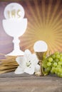 Eucharist symbol of bread and wine, chalice and host, First comm Royalty Free Stock Photo