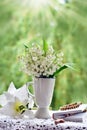 First Holy Communion still life with rosary and lily of the valley flowers Royalty Free Stock Photo