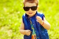 First investment concept. Portrait of baby boy with coin Royalty Free Stock Photo