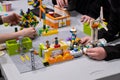 At First Lego League children build robots and solve robotics challenges