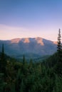 First light of morning hitting the mountains of the Sullivan Mountain Range, Washington. Royalty Free Stock Photo