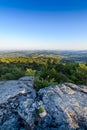 First lights of the day on the rock, Roche d Ajoux, Beaujolais, France Royalty Free Stock Photo