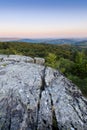 First lights of the day on the rock, Roche d Ajoux, Beaujolais, France Royalty Free Stock Photo